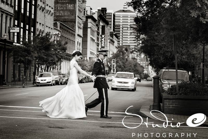 Bride and groom walking Louisville Wedding at the Frazier Museum 